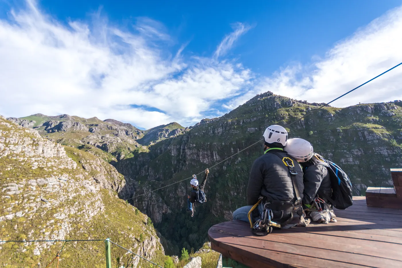 Ziplining between the mountains on Cape Canopy Tour